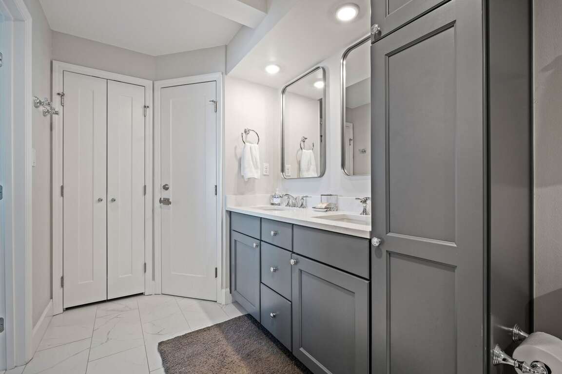 The master bathroom offers plenty of space and ample storage The master bathroom offers plenty of space and ample storage