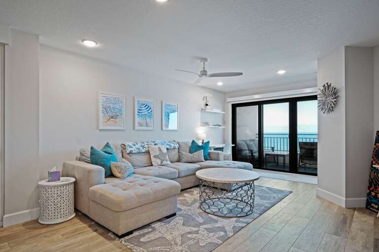 Relax in the direct oceanfront living room, beautifully adorned with coastal decor Relax in the direct oceanfront living room, beautifully adorned with coastal decor