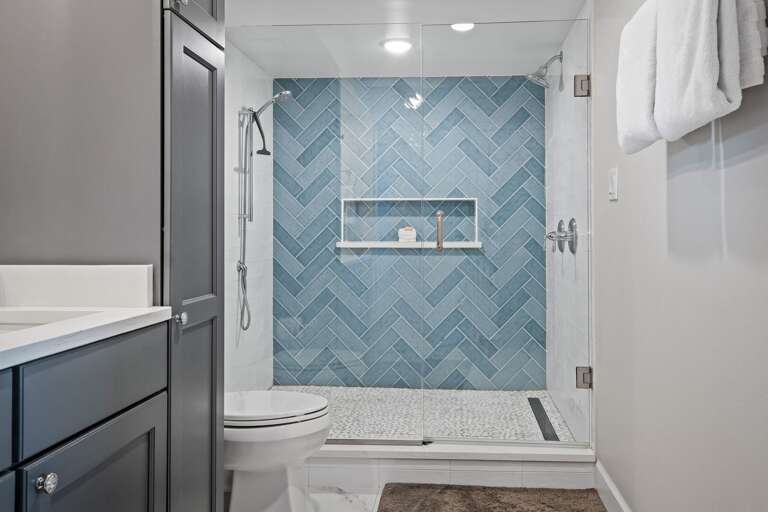 The updated master bathroom features a beautiful glass and tile shower The updated master bathroom features a beautiful glass and tile shower