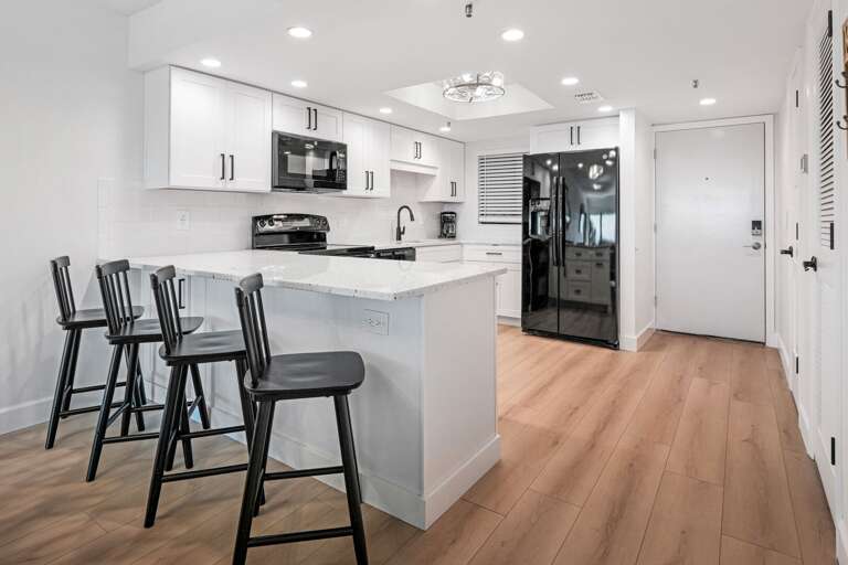 There are 4 bonus bar stools for additional seating at the kitchen countertop There are 4 bonus bar stools for additional seating at the kitchen countertop