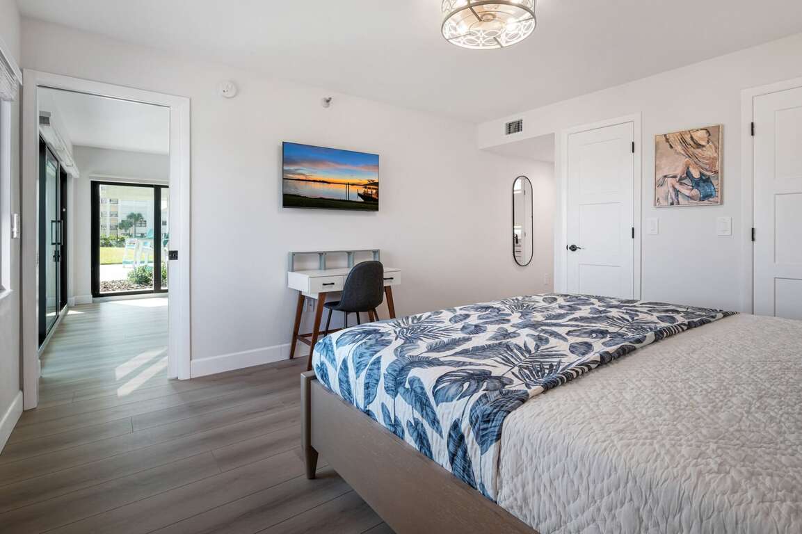 The master bedroom has a mounted TV and an ensuite bathroom The master bedroom has a mounted TV and an ensuite bathroom