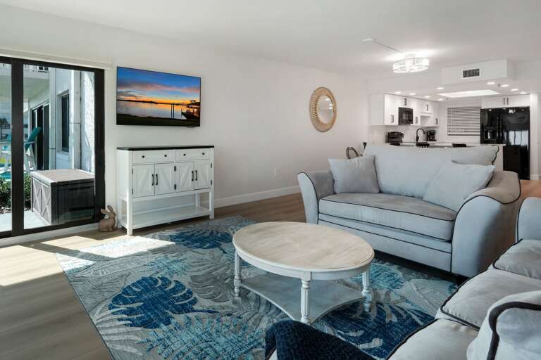 The oceanfront living room has a large TV with cable The oceanfront living room has a large TV with cable