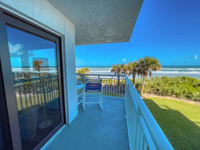 Enjoy panoramic coastal views from the spacious wrap-around balcony Enjoy panoramic coastal views from the spacious wrap-around balcony