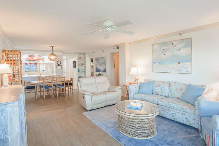 The condo features coastal decor throughout, creating a relaxing and beach-inspired atmosphere The condo features coastal decor throughout, creating a relaxing and beach-inspired atmosphere
