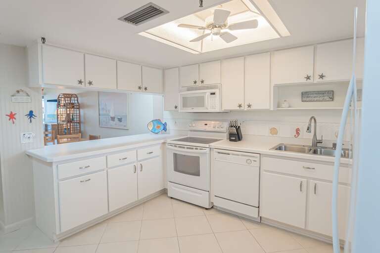 The fully equipped kitchen includes everything you need to prepare meals during your beach getaway The fully equipped kitchen includes everything you need to prepare meals during your beach getaway