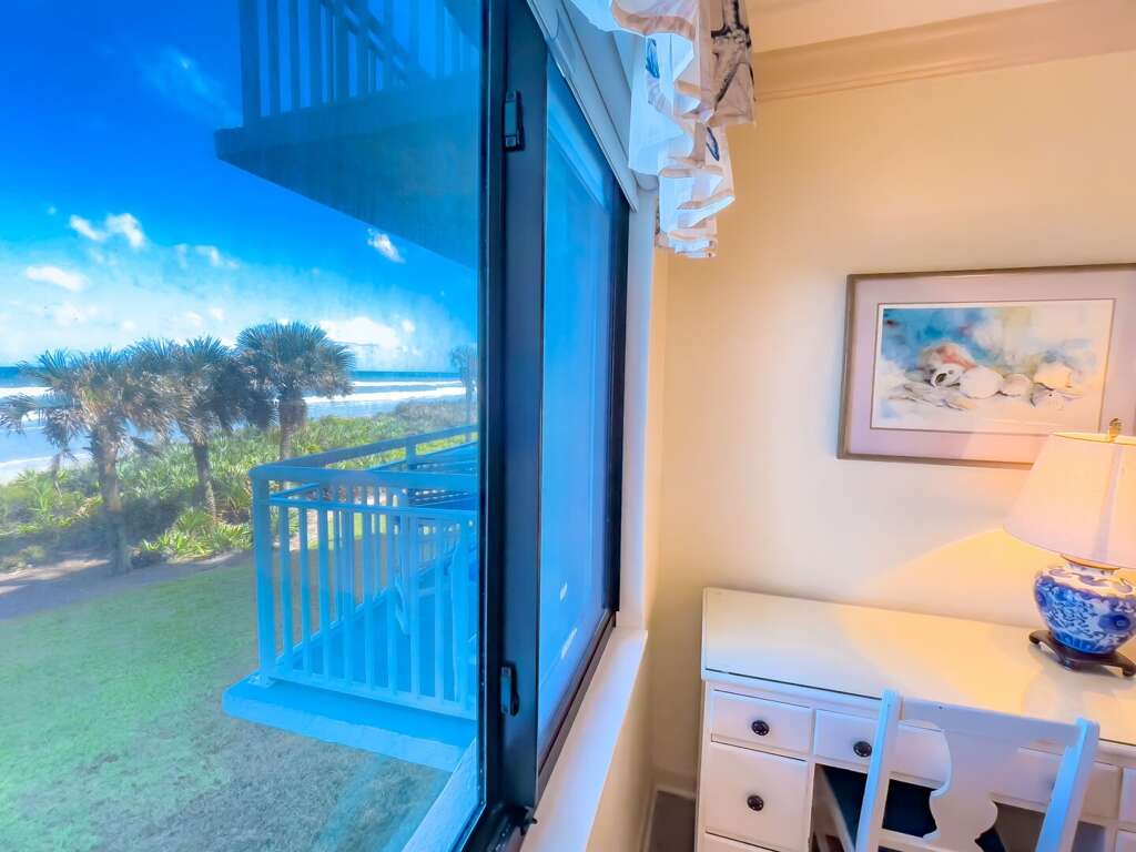 The master bedroom boasts a view of New Smyrna Beach, allowing you to wake up to the sights and sounds of the ocean The master bedroom boasts a view of New Smyrna Beach, allowing you to wake up to the sights and sounds of the ocean