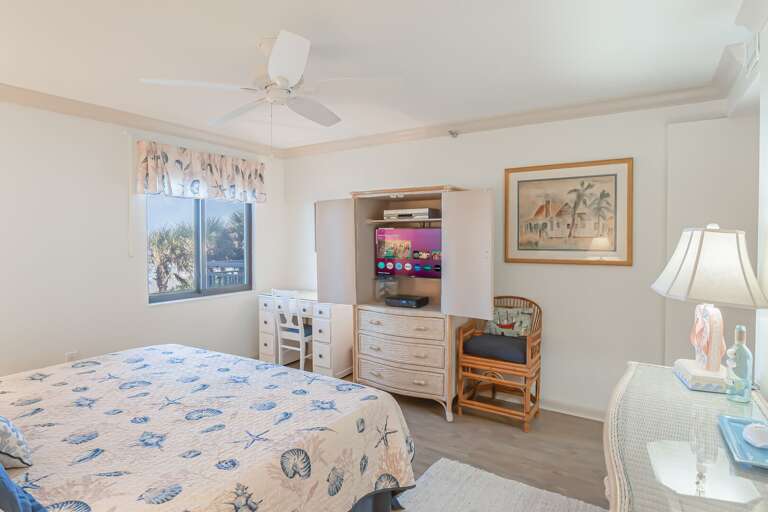 The master bedroom includes a smart TV and a dedicated work space with a desk and chair for your convenience The master bedroom includes a smart TV and a dedicated work space with a desk and chair for your convenience