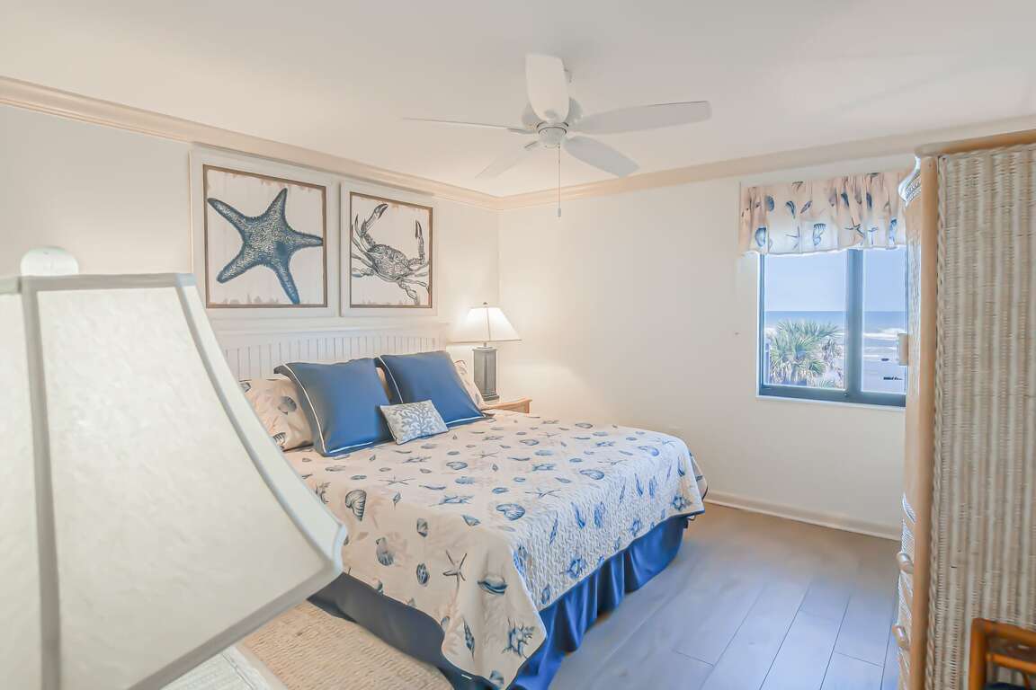 The oceanfront master bedroom features a king bed and stunning views of the Atlantic Ocean The oceanfront master bedroom features a king bed and stunning views of the Atlantic Ocean