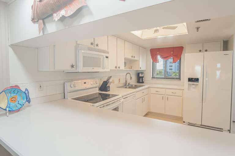 The spacious kitchen has ample room to prepare meals, making it easy to cook and entertain during your stay The spacious kitchen has ample room to prepare meals, making it easy to cook and entertain during your stay