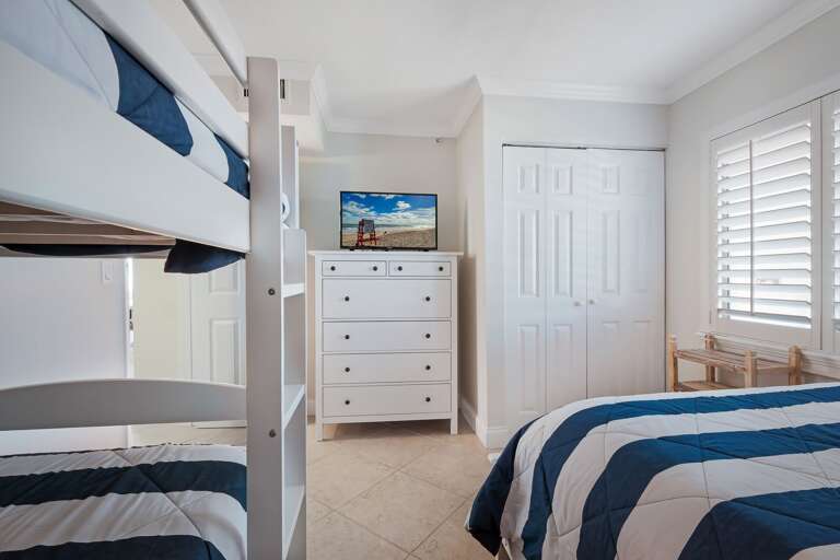 All bedrooms have their own TVs, including the guest bedroom