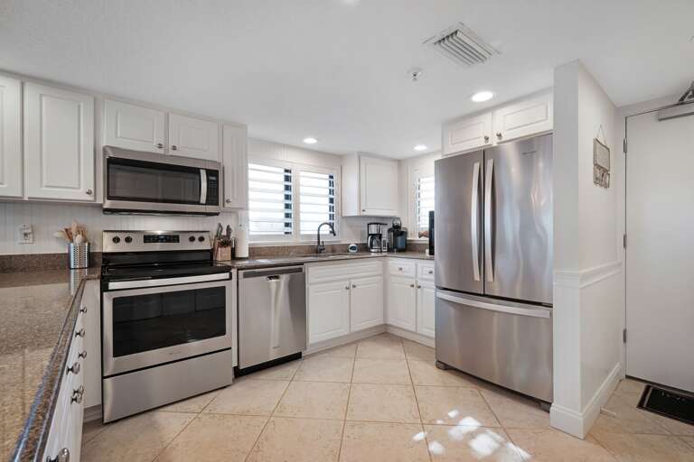 Spacious kitchen with stainless steel appliances