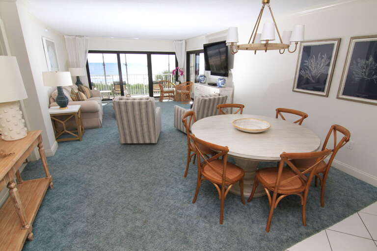 Dining room, living room, and ocean view from the kitchen counter Dining room, living room, and ocean view from the kitchen counter