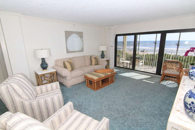 Watch TV or the waves from the couch in the open living room Watch TV or the waves from the couch in the open living room