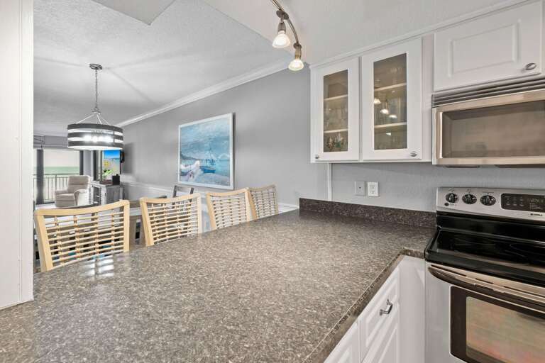 Take in the gorgeous ocean view while preparing meals in the kitchen