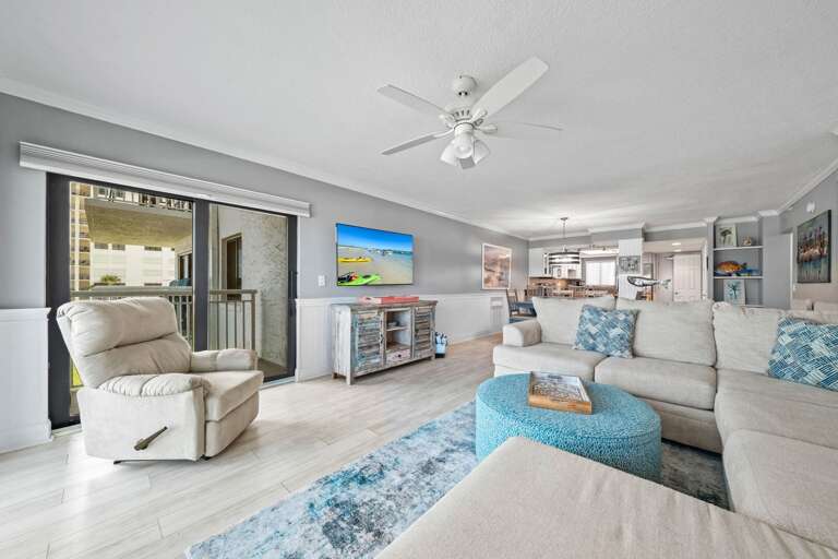 Large, mounted TV and recliner in the living room