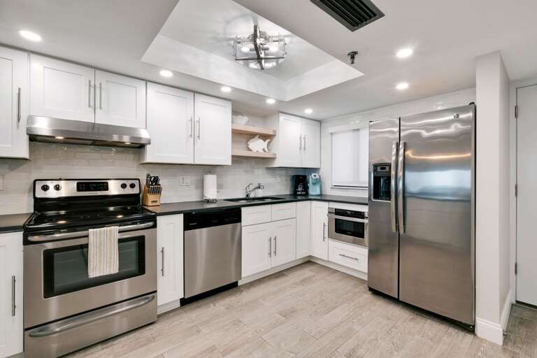 The fully-equipped kitchen has been updated with premium appliances and finishes The fully-equipped kitchen has been updated with premium appliances and finishes