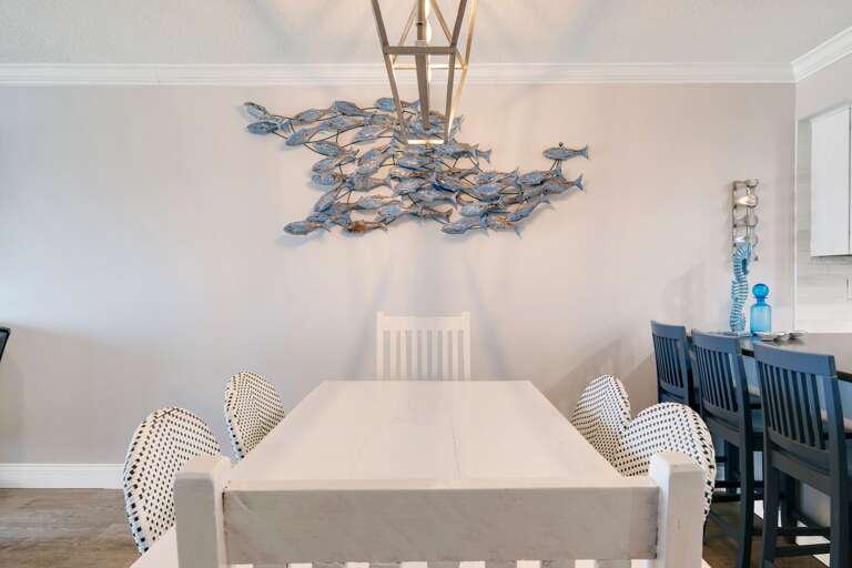 The oceanfront dining room table seats 6 The oceanfront dining room table seats 6