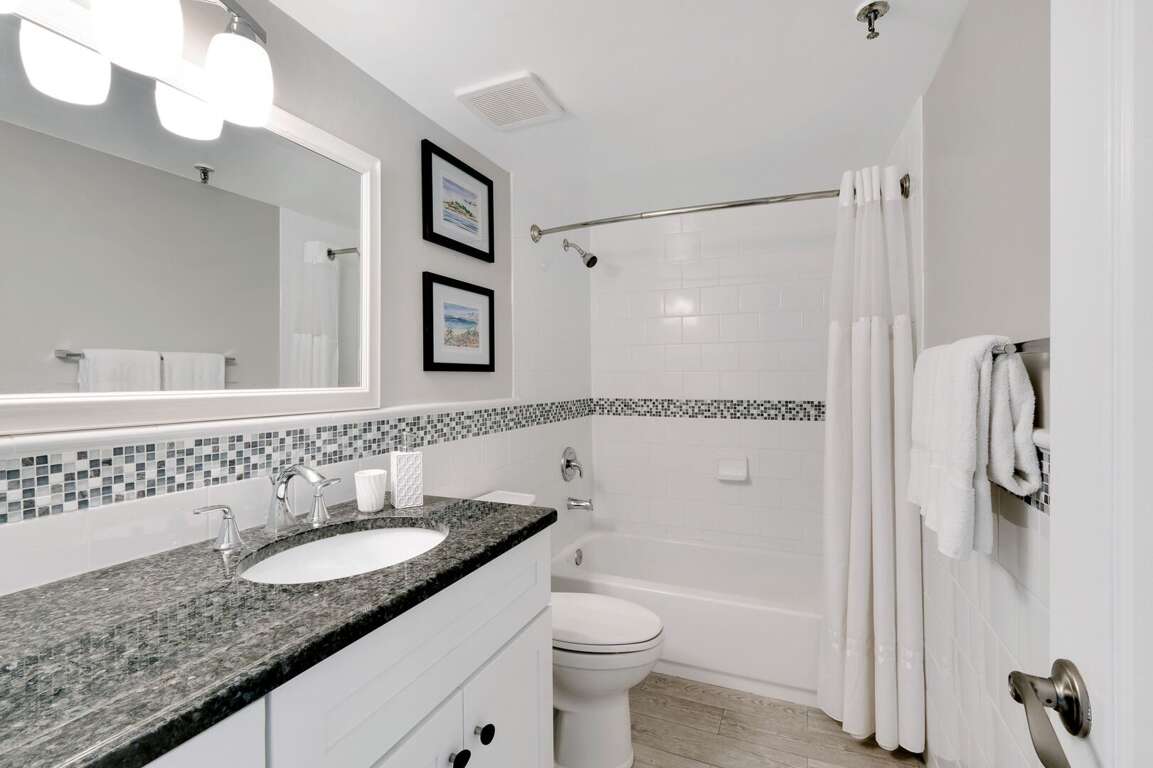 The updated master bathroom has a tub/shower combo and plush, spa towels The updated master bathroom has a tub/shower combo and plush, spa towels