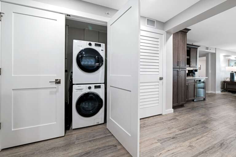 A full-sized washer and dryer is conveniently located inside the condo A full-sized washer and dryer is conveniently located inside the condo