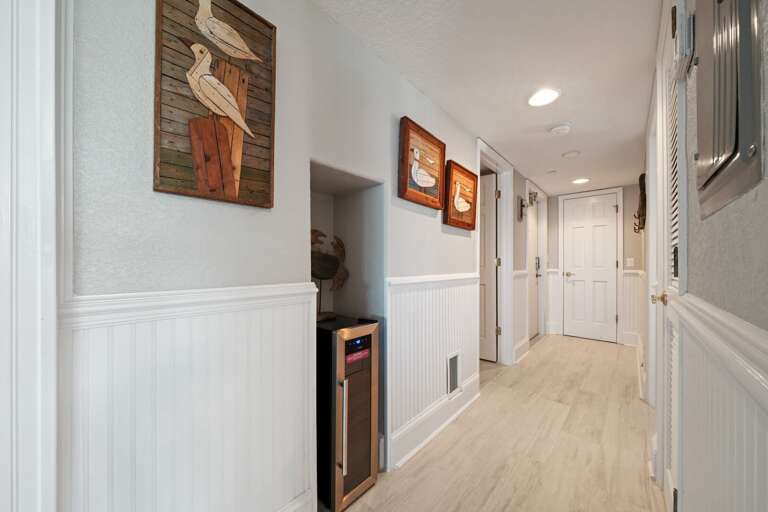 Luxurious touches, including a wine fridge, can be found throughout the condo