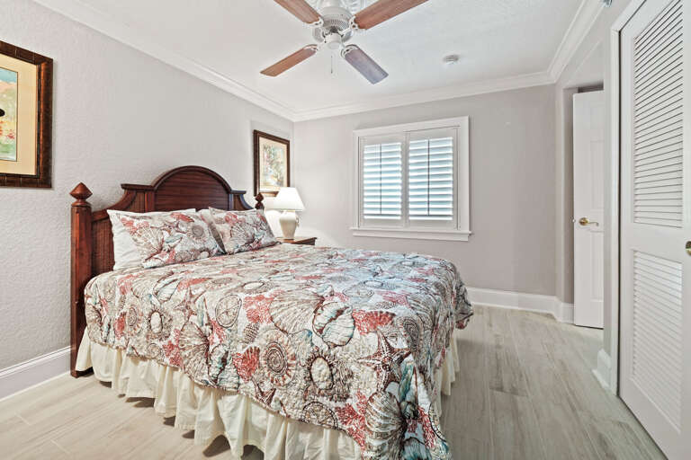 The queen guest bedroom includes an attached bathroom and a closet for added storage