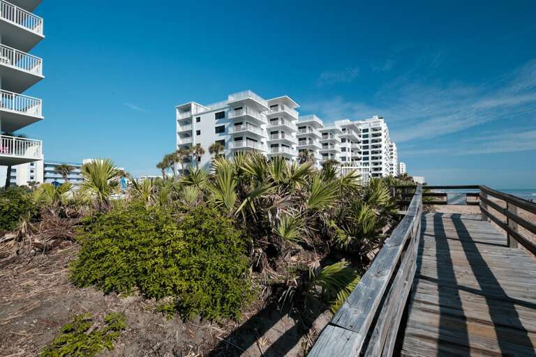 Shorehom by the Sea features a private beach boardwalk for easy access to the sand