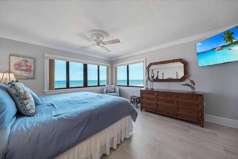 Wake up to breathtaking Atlantic Ocean views from the master bedroom, complete with a plush king bed for ultimate comfort