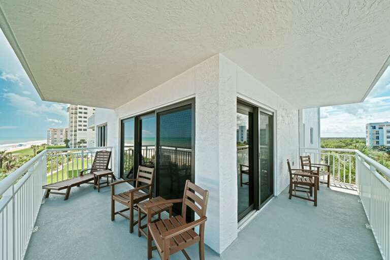 Wrap-around corner balcony offering spectacular views of the ocean, beach, and pool