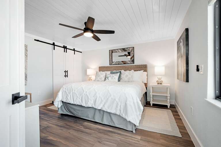 King bed in the elegant master bedroom