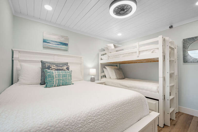 Sleep up to 4 guests with a queen bed and twin bunk bed in the guest bedroom