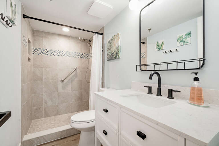 Updated guest bathroom with a tile shower