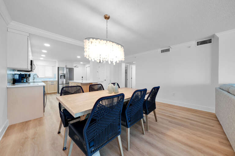 Take a seat at the dining room table for lunch before heading back to the beach