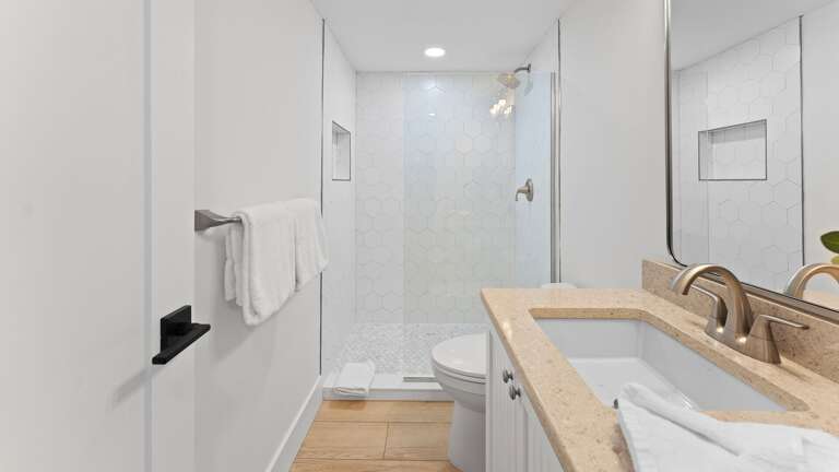Enjoy the modern touches of the updated guest bathroom