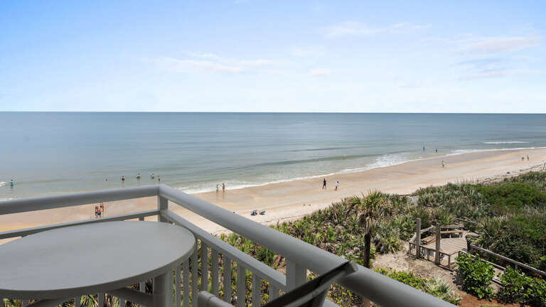 The spacious wrap-around balcony offers the ideal vantage point to soak in stunning New Smyrna Beach sunrises and gentle ocean breezes