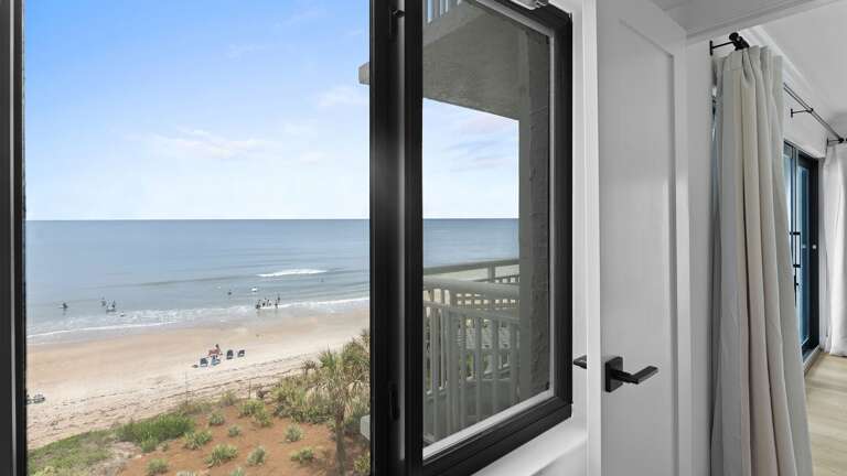 Wake up to a breathtaking oceanfront view of New Smyrna Beach right from the master bedroom