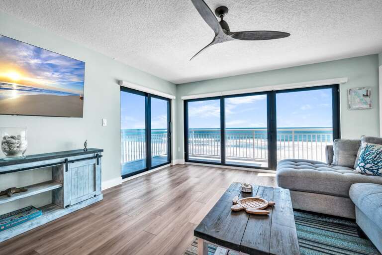 Direct oceanfront living room proving unparalleled New Smyrna Beach and Atlantic Ocean views