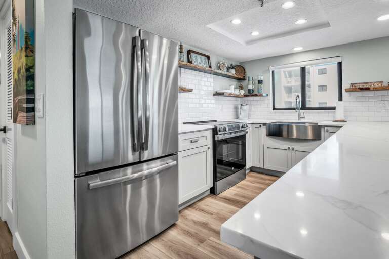 The updated kitchen has stainless steel appliances and is fully equipped with everything you need during your vacay