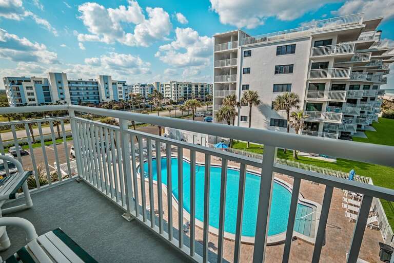 View of Shorehom by the Sea's seasonally heated pool from the wrap-around balcony