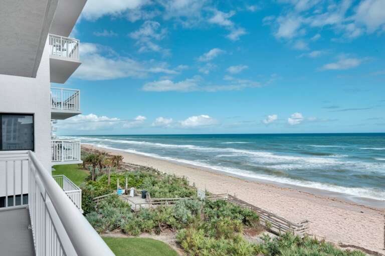 Enjoy an unparalleled view of no-drive New Smyrna Beach from the large, 4th floor balcony
