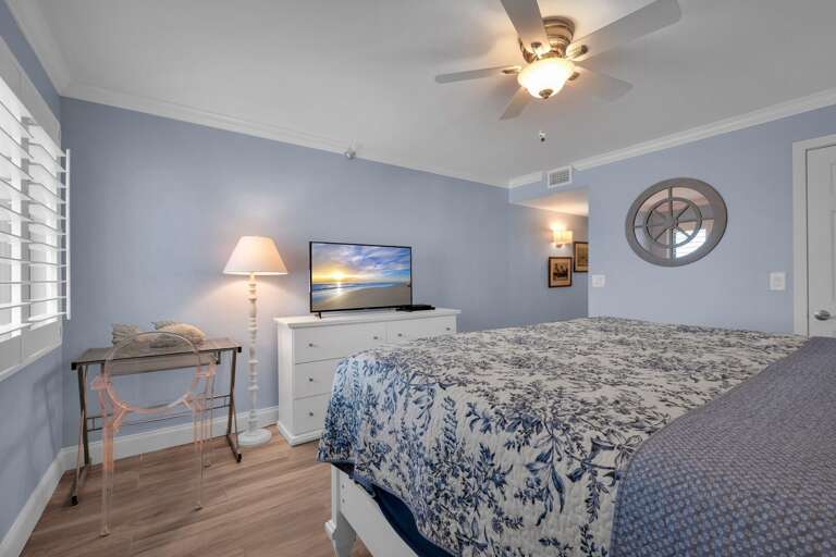King bed and TV in the master bedroom