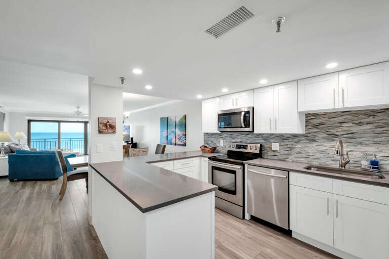 Soak in the beauty of New Smyrna Beach while cooking in the updated kitchen