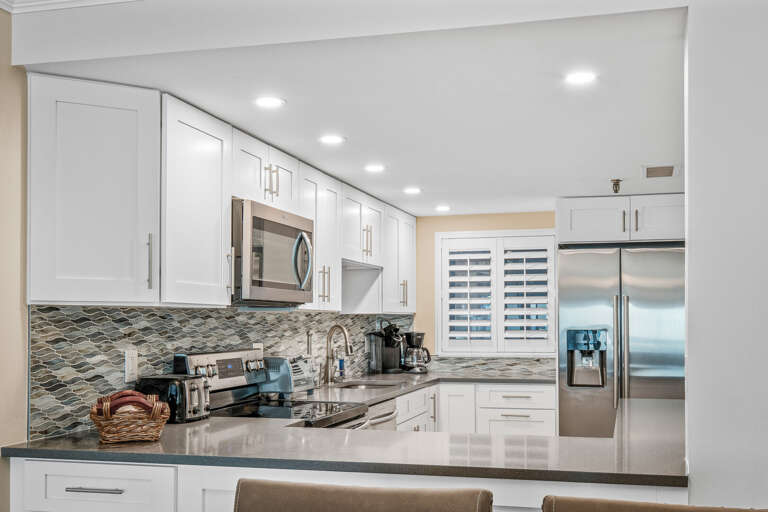 Updated kitchen stocked with everything you need to cook while on your vacay