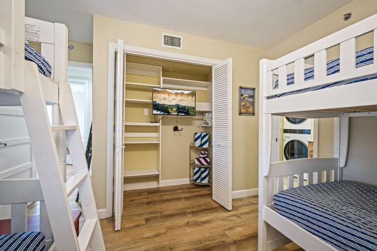 Each bedroom, including the guest bedroom, is equipped with its own TV, ensuring everyone can enjoy their favorite shows