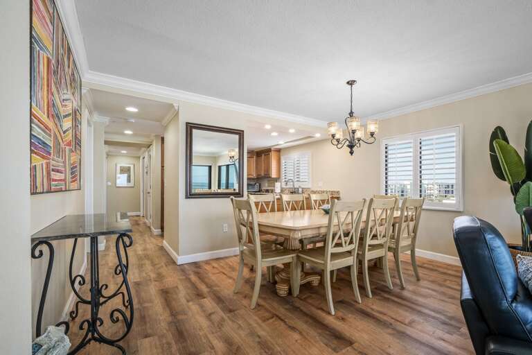 The dining room offers seating for eight with a beautiful ocean view