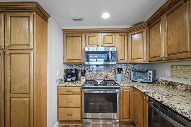 The updated, fully equipped kitchen is perfect for preparing delicious meals during your oceanfront stay in New Smyrna Beach