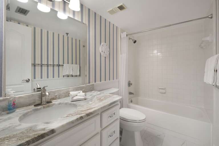 Combo shower and tub in the master bathroom. Combo shower and tub in the master bathroom.