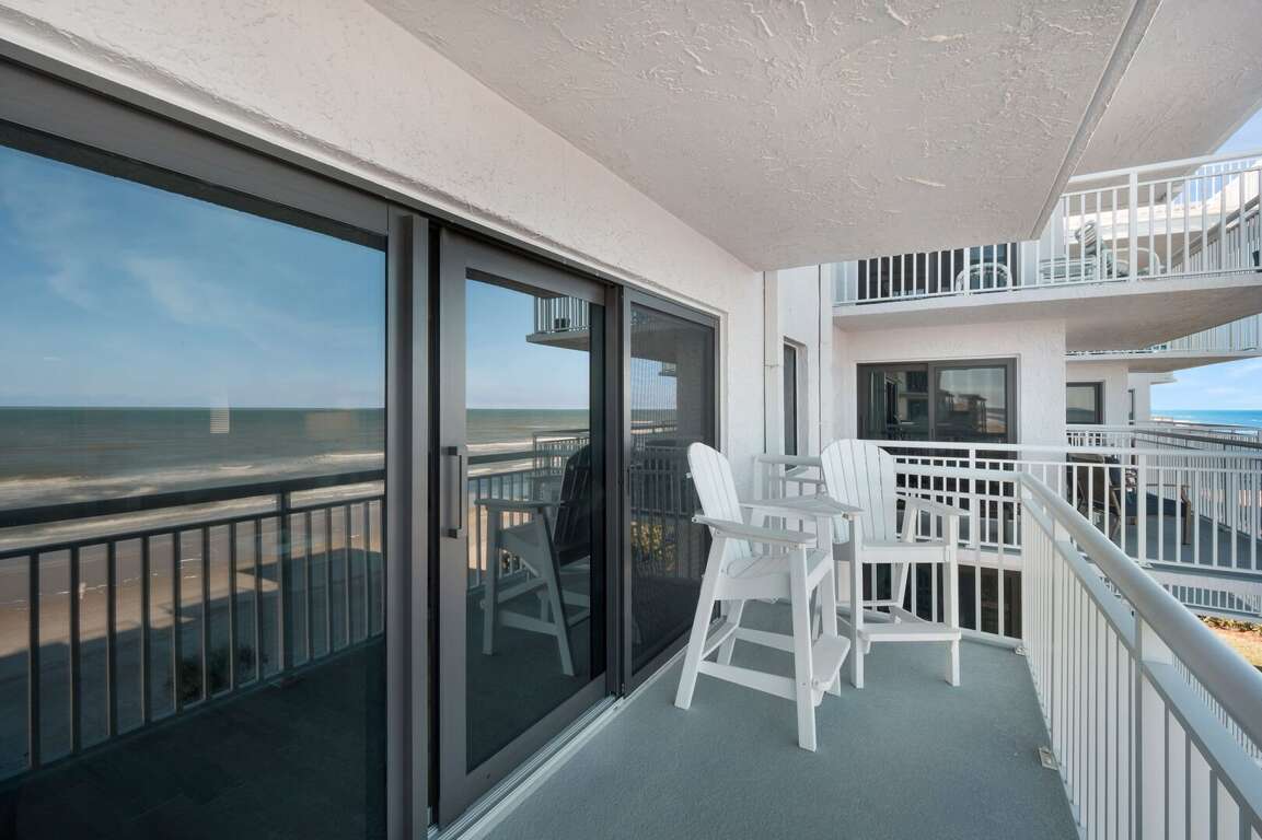 Comfortable balcony furniture to relax while taking in the beach front views. Comfortable balcony furniture to relax while taking in the beach front views.