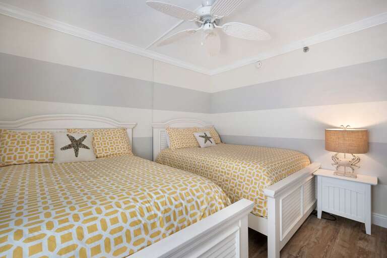 Escape to the guest bedroom to relax in one of the two double beds. Escape to the guest bedroom to relax in one of the two double beds.