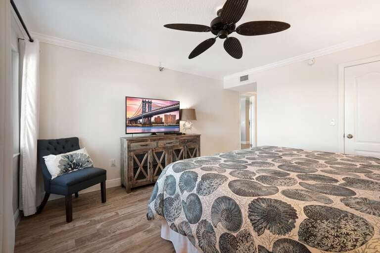 Watch the smart TV from the king bed in the master bedroom. Watch the smart TV from the king bed in the master bedroom.