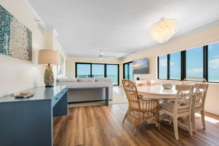 The corner location means more windows, offering beautiful ocean views and an abundance of natural sunlight, creating a vibrant atmosphere in this New Smyrna Beach property